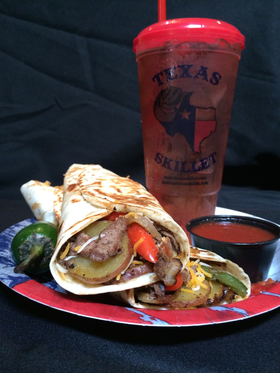 Cowboy burrito with steak, skillet potatoes, and cheese
